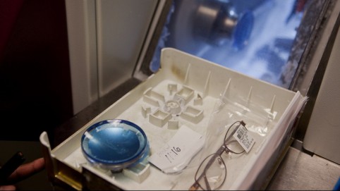 Eyeglasses in an optical lab tray