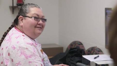 Health care worker at her computer 